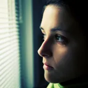 Teen looking through the window