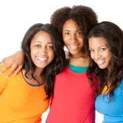 3 young women smiling