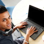 Boy working on laptop