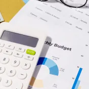 Calculator and documentation with household budget.