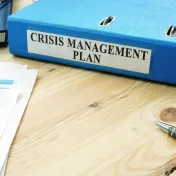 Image of crisis management plan binder